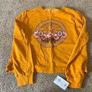 Long sleeved crop top with graphic